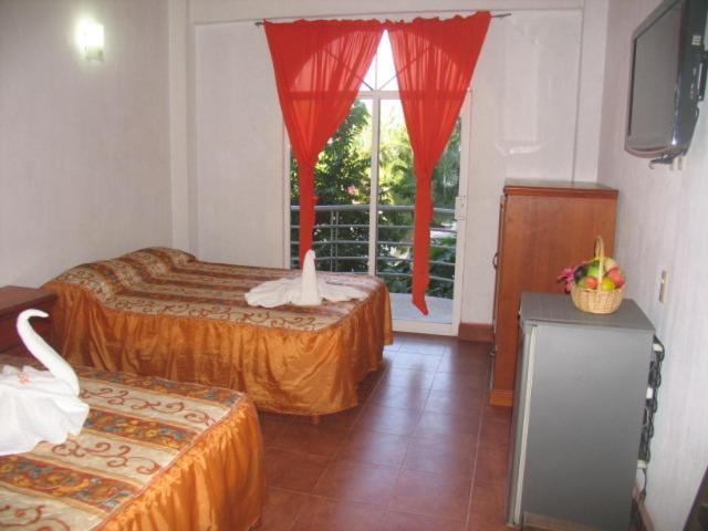 Hotel Y Suites Bugambilias Rincon de Guayabitos Szoba fotó